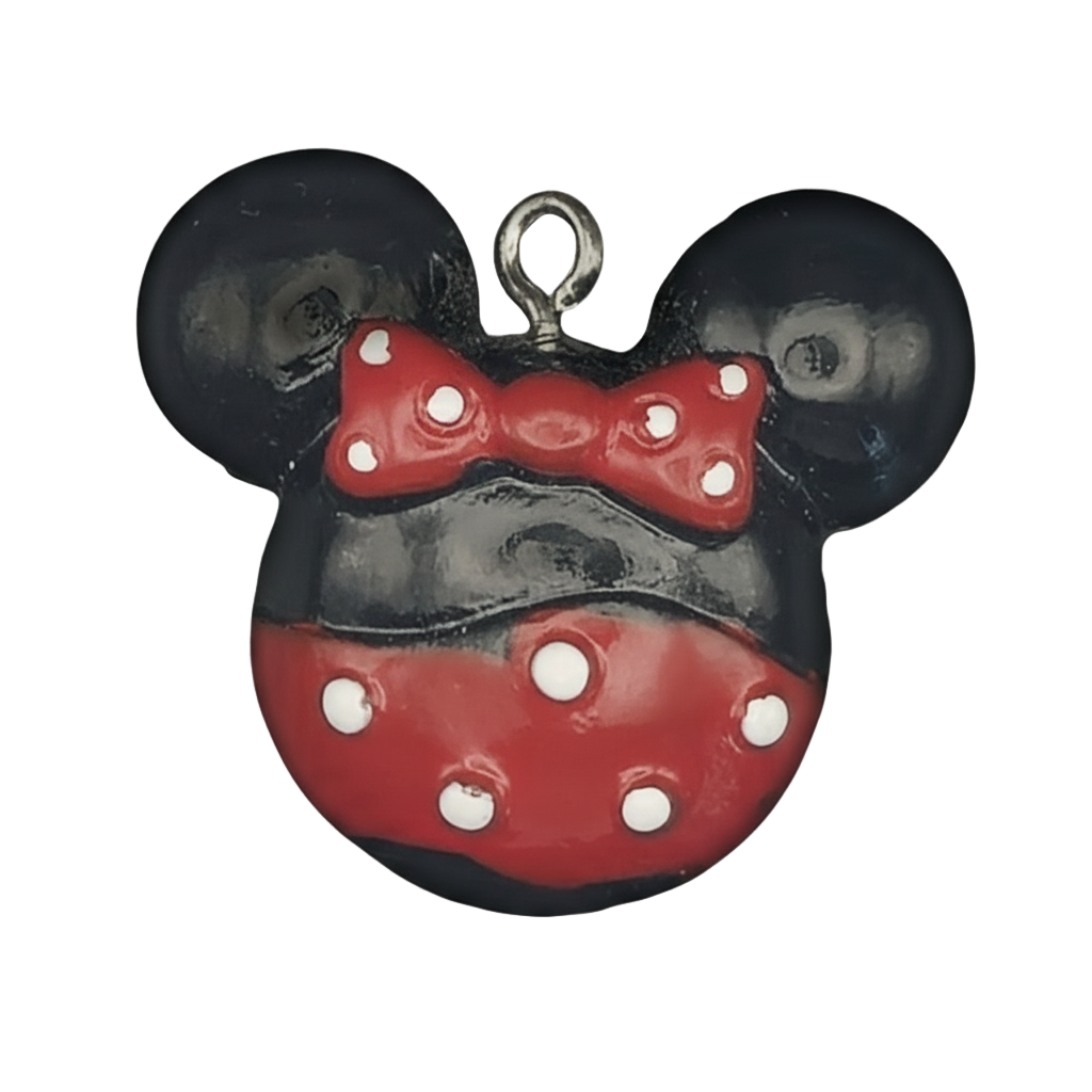 close-up of black and red mouse head charm with red bow and white polka dots