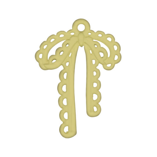 close-up of yellow scalloped bow charm