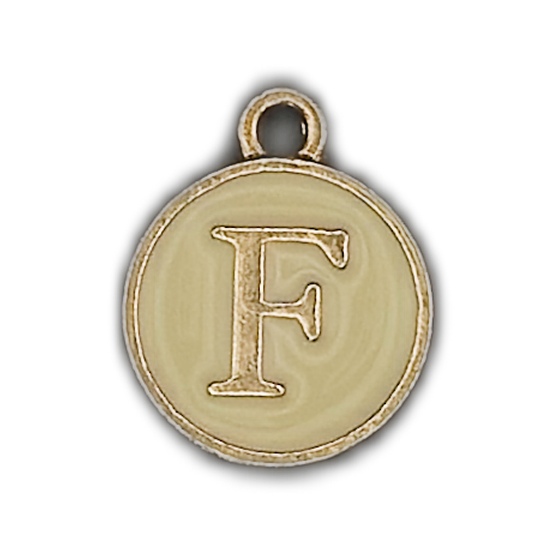 close-up of round gold and cream charm with letter F
