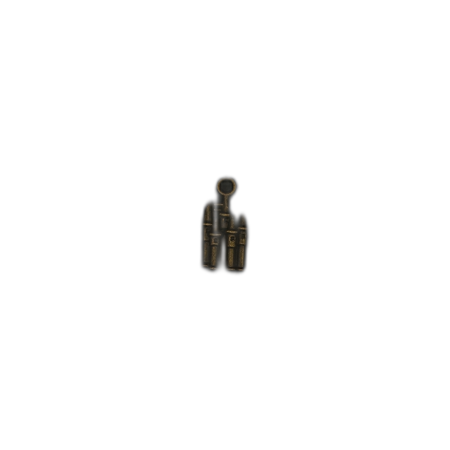 Small bronze castle charm centered on a black background with ample space.