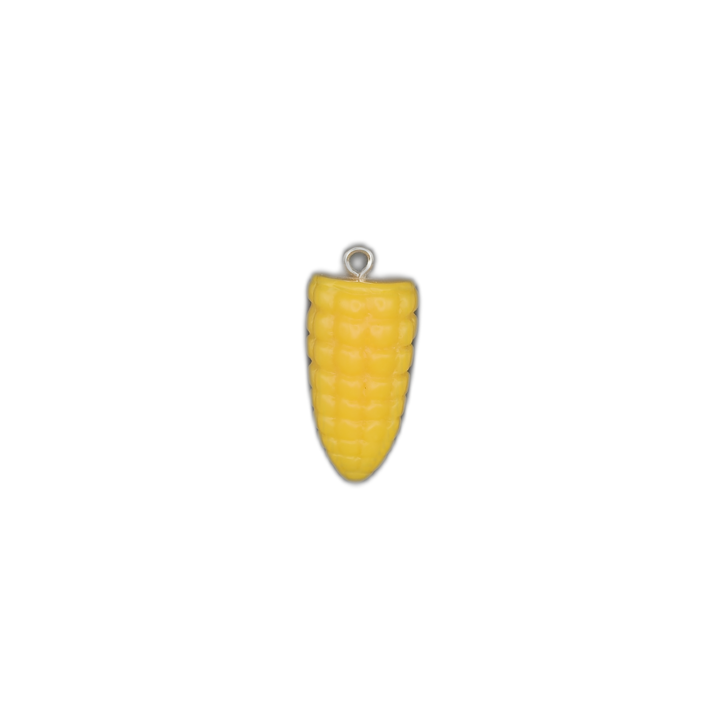 Yellow corn cob charm centered on a black background.