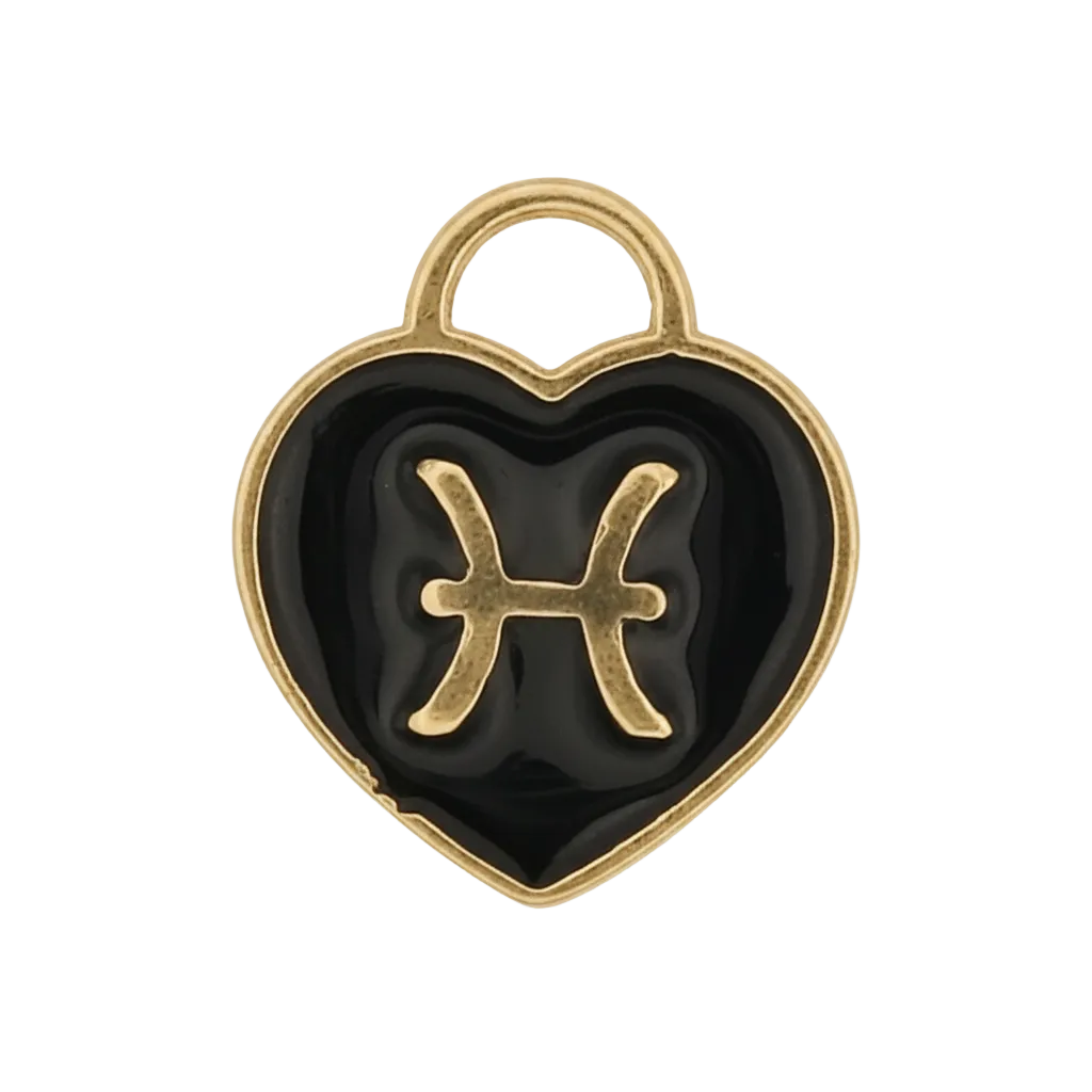 close-up of a gold and black heart charm with the Pisces symbol