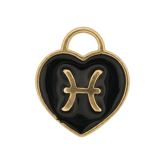 close-up of a gold and black heart charm with the Pisces symbol