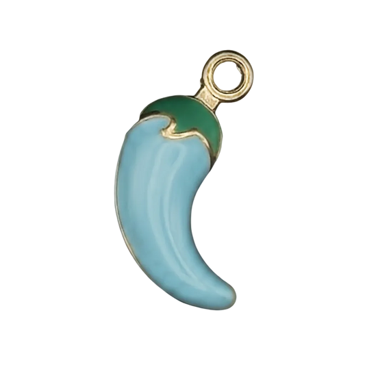 close-up of a light blue chili pepper enamel charm with green top and gold trim on black background