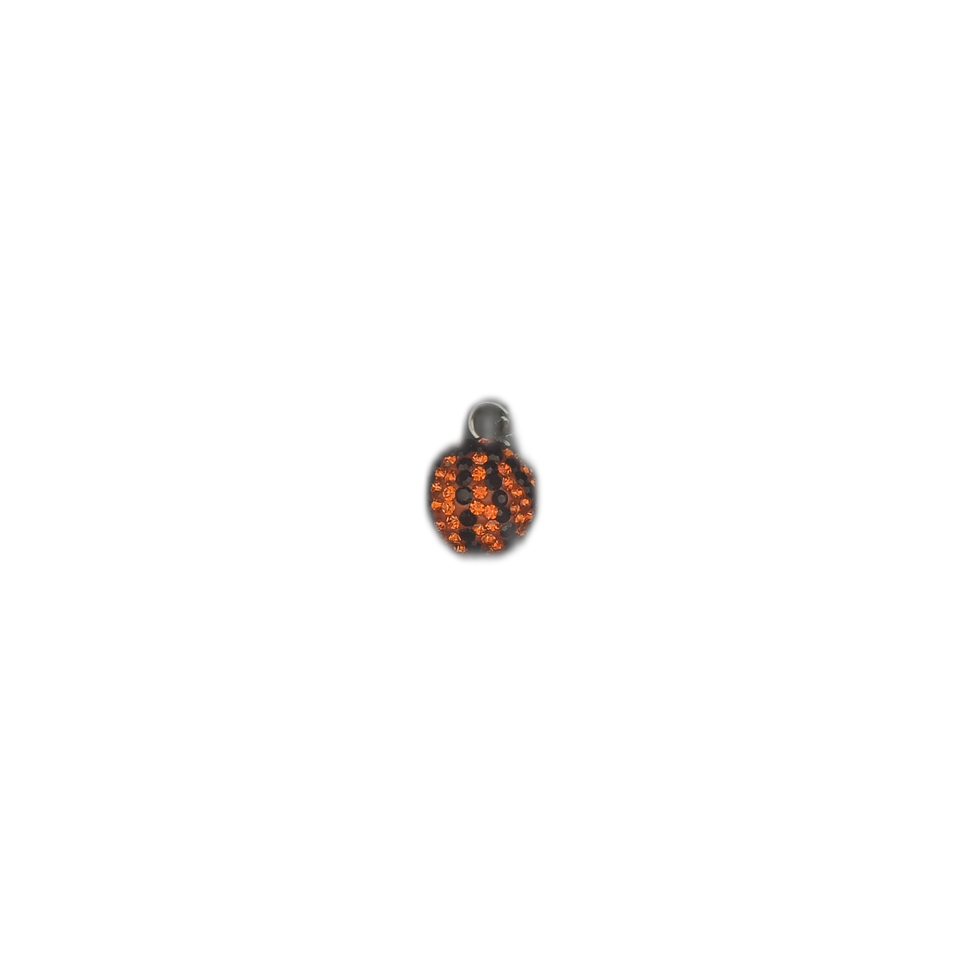 small round charm with orange rhinestones and black pavé accents