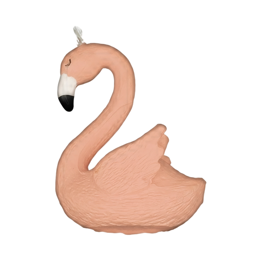 close-up of pink flamingo bird charm with black and white beak on a black background