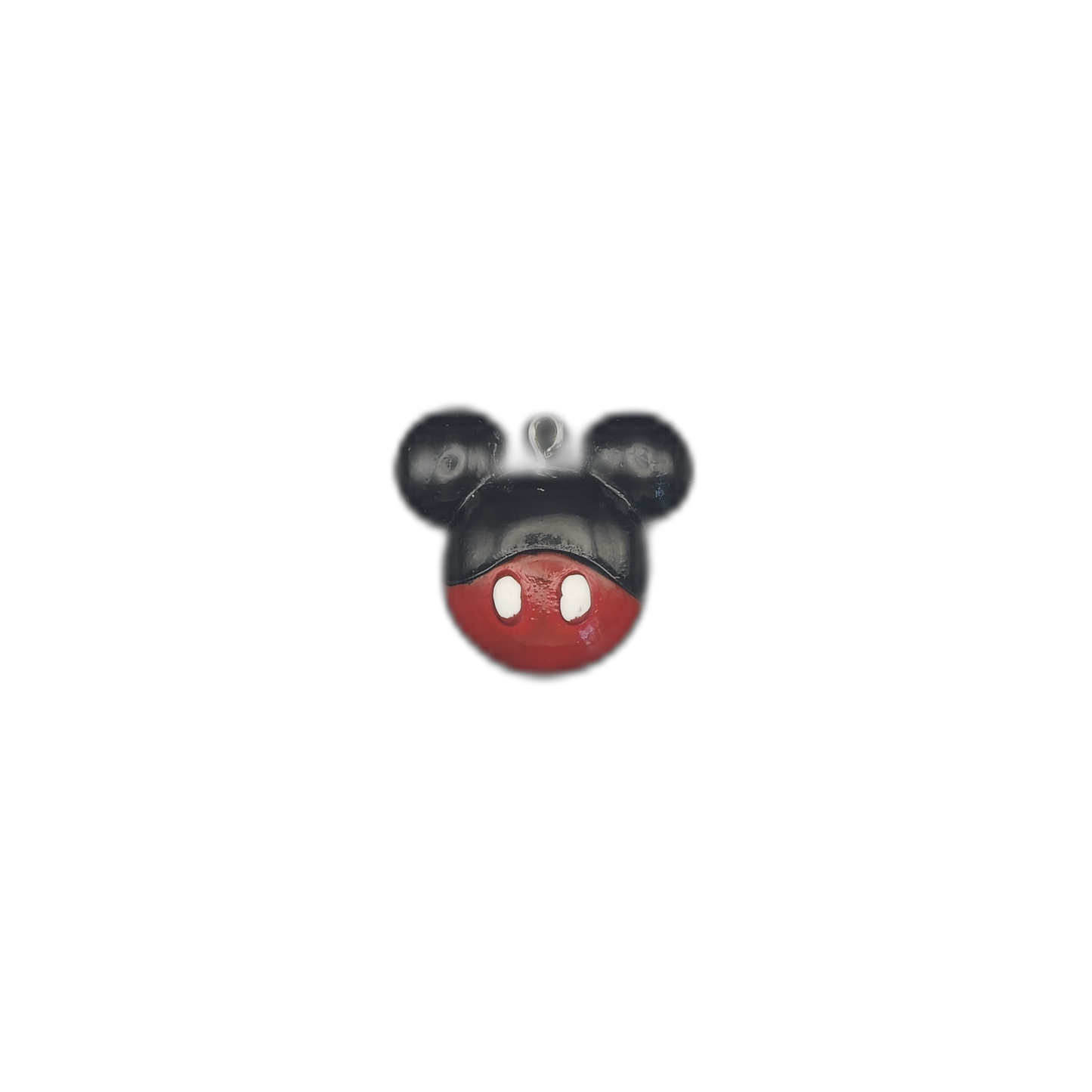 small mouse head charm on black background