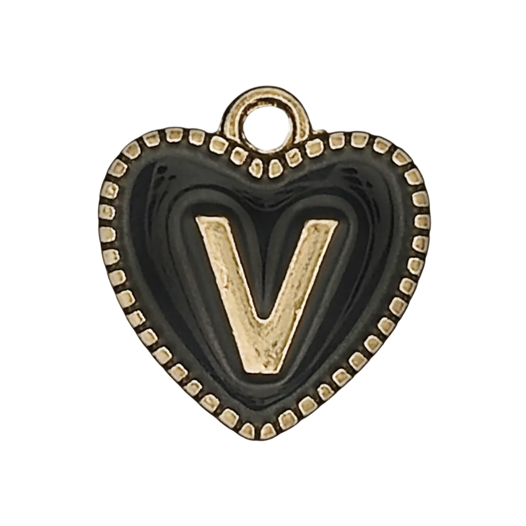 close-up of a black heart charm with a gold V and beaded border