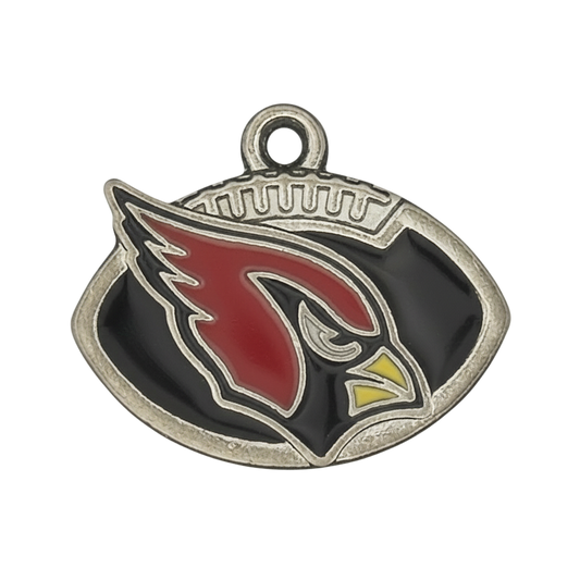 close-up of silver-tone football-shaped charm with red cardinal head