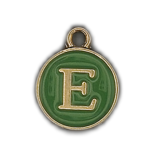 close-up of round green enamel charm with gold letter E