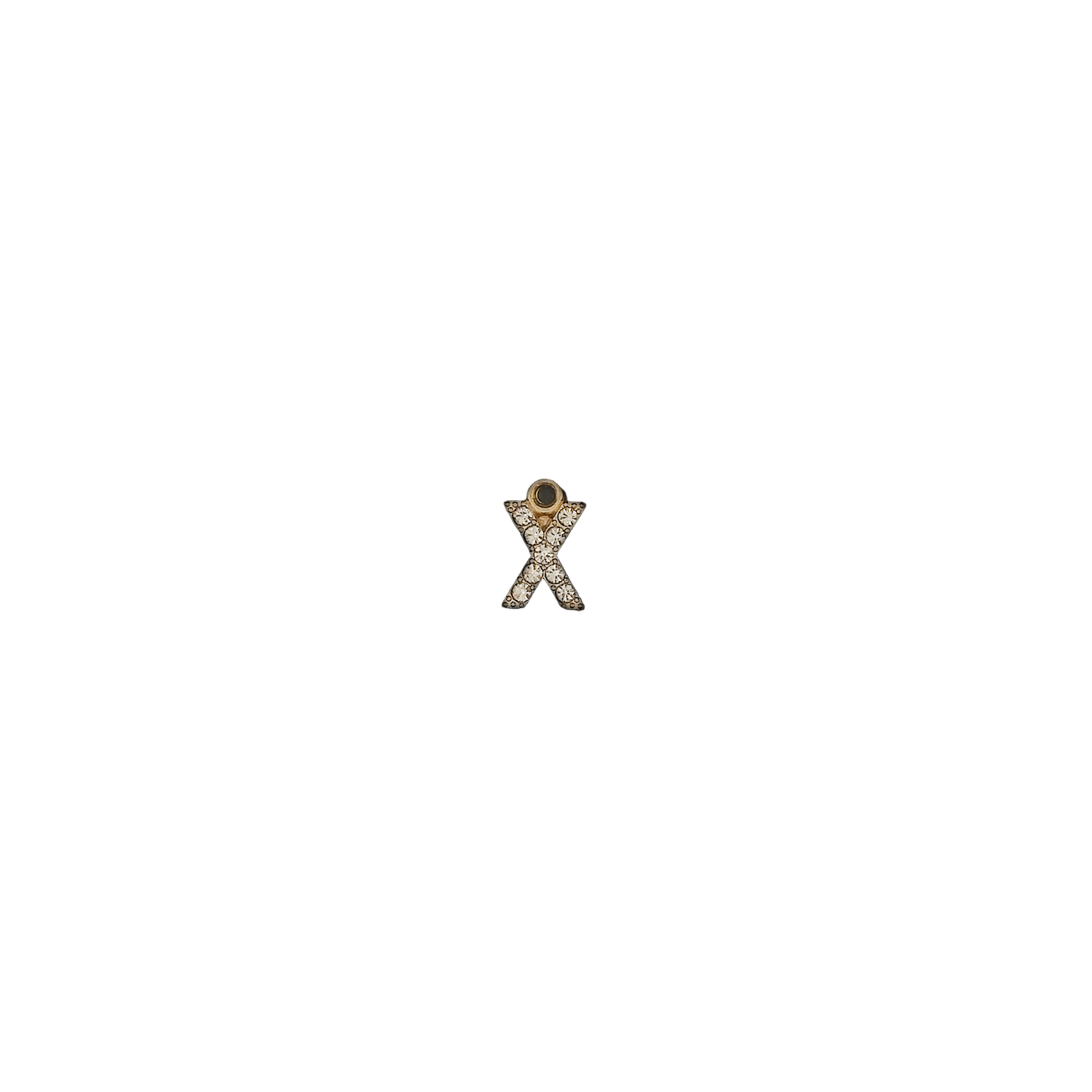 small gold-tone crystal letter X charm centered on black background