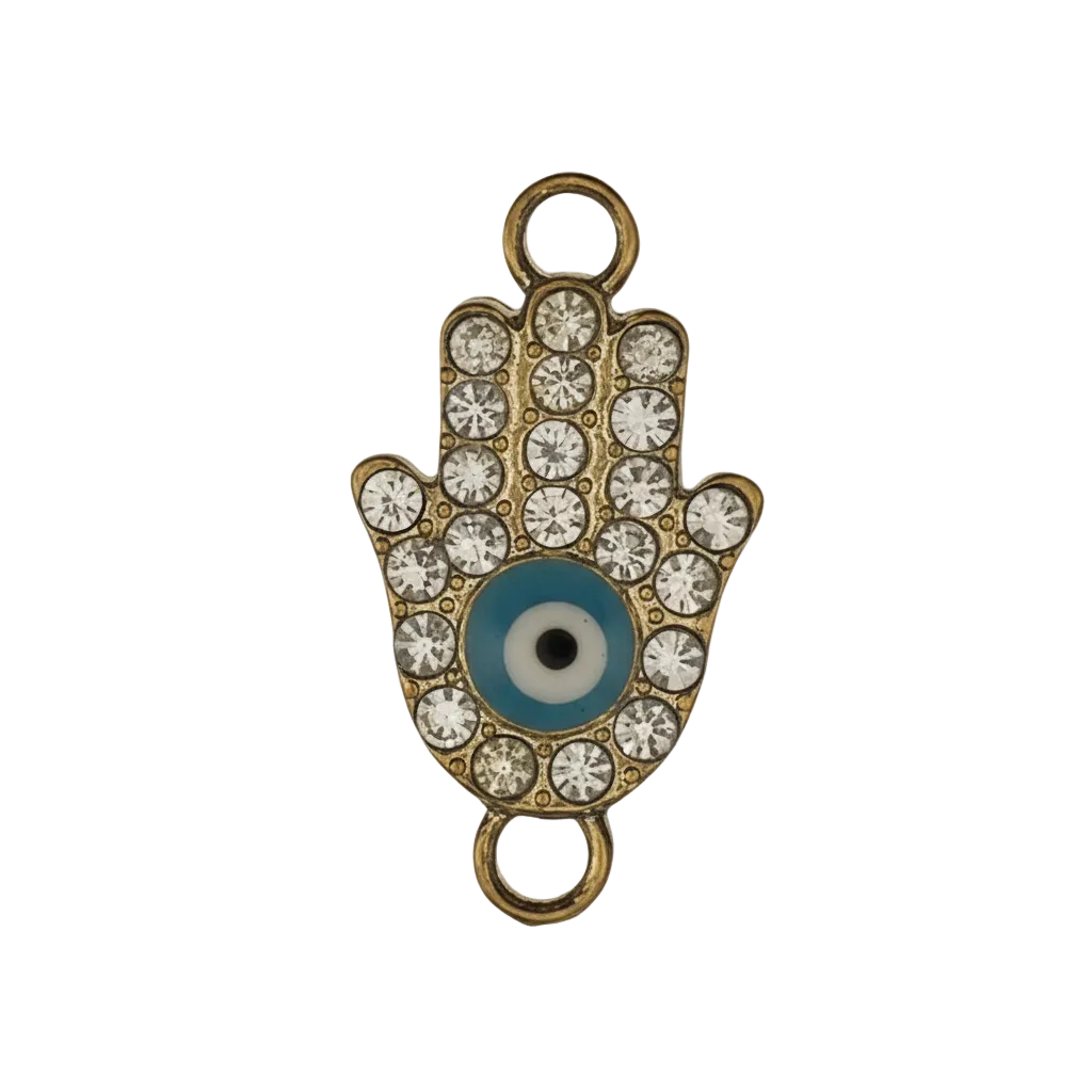close-up of a gold-tone hamsa hand charm with clear rhinestones and a blue evil eye on a black background