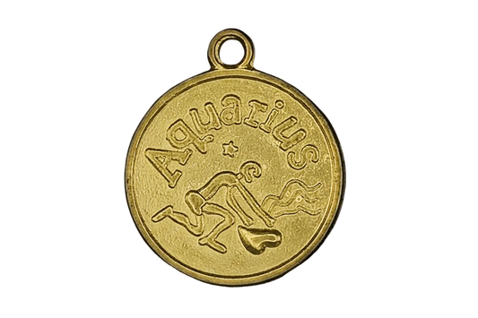 Close-up of a gold round Aquarius zodiac charm with water-bearer figure and star on a black background.