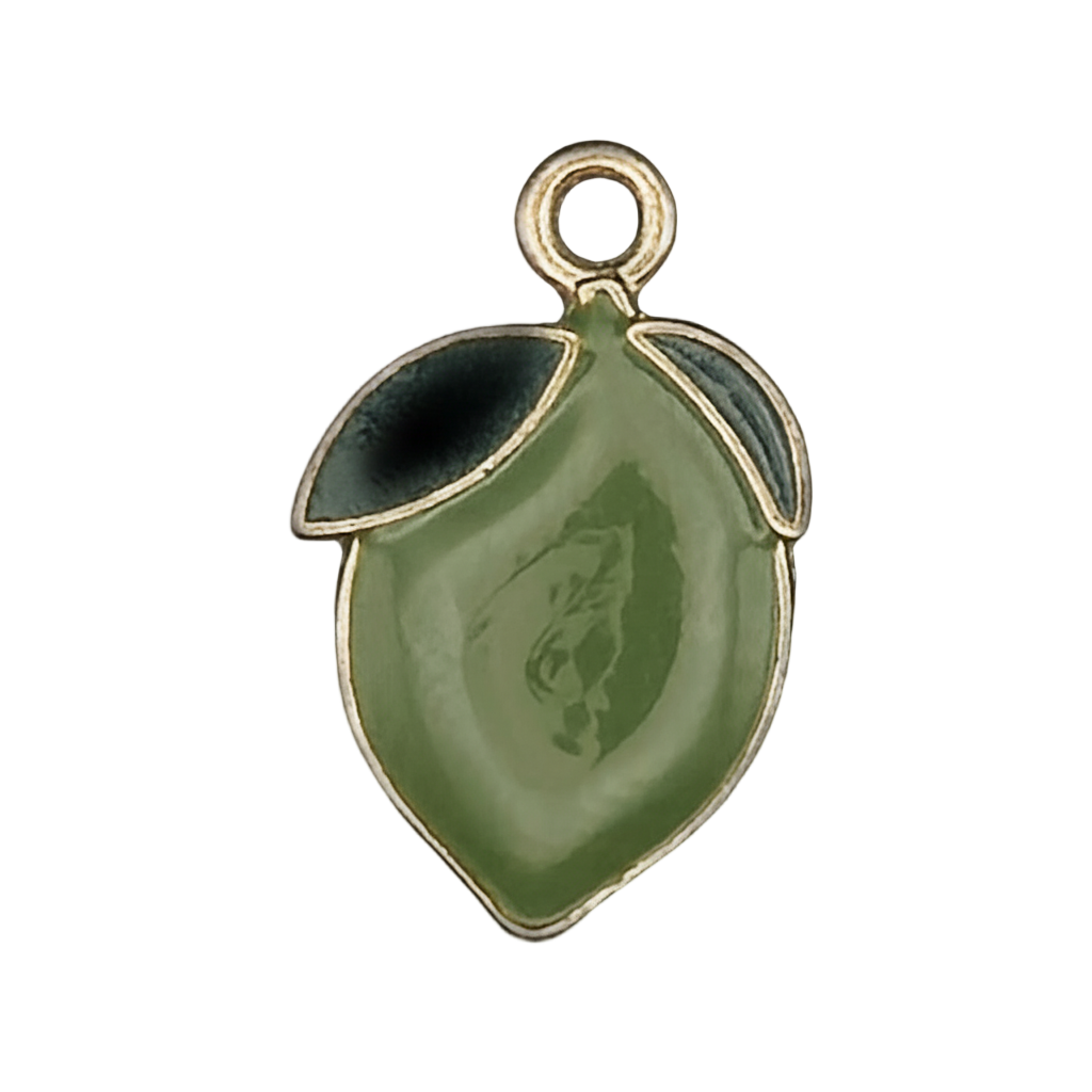 close-up of green lemon-shaped enamel charm with two leaves on a black background