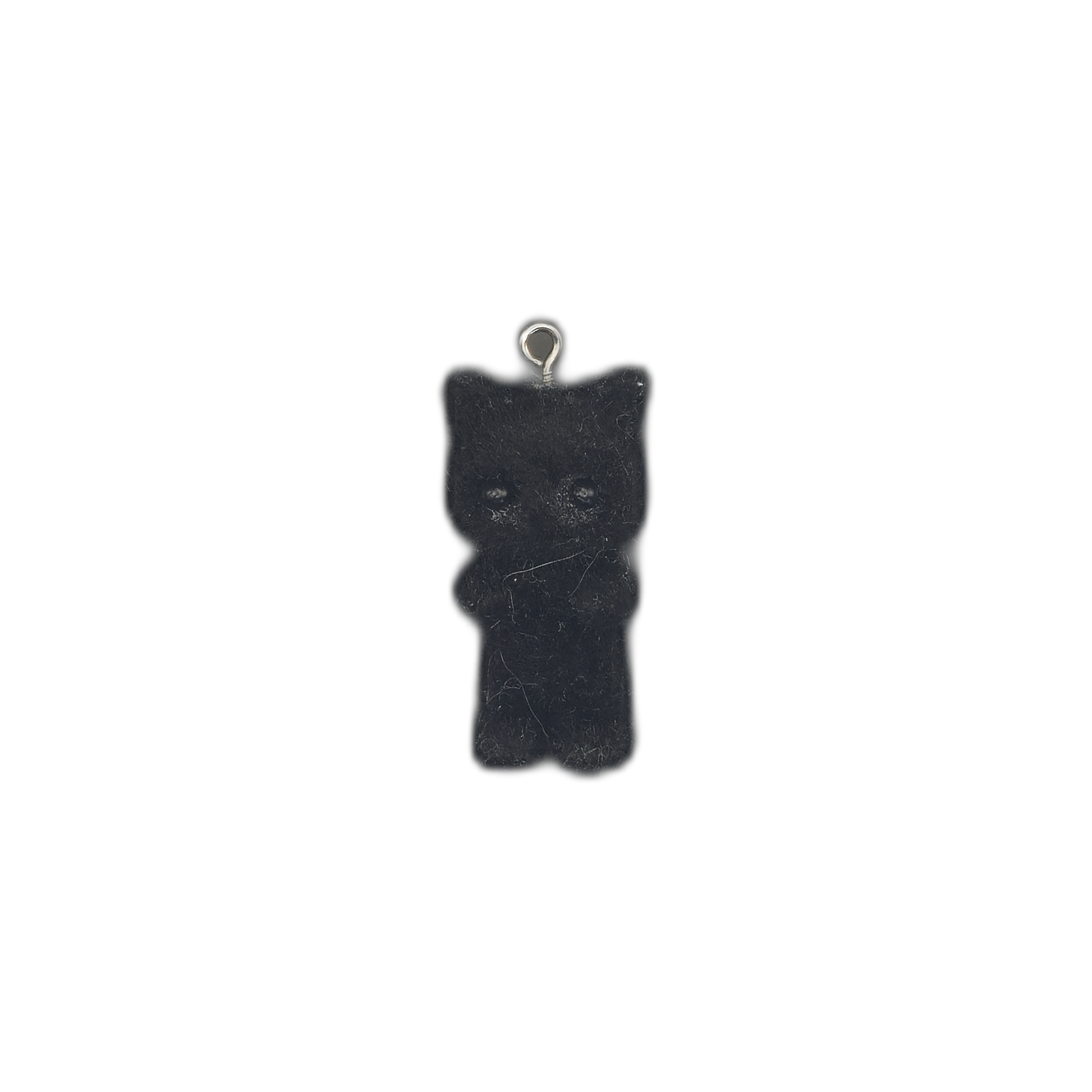 full view of a black gummy bear-shaped charm centered on a black background
