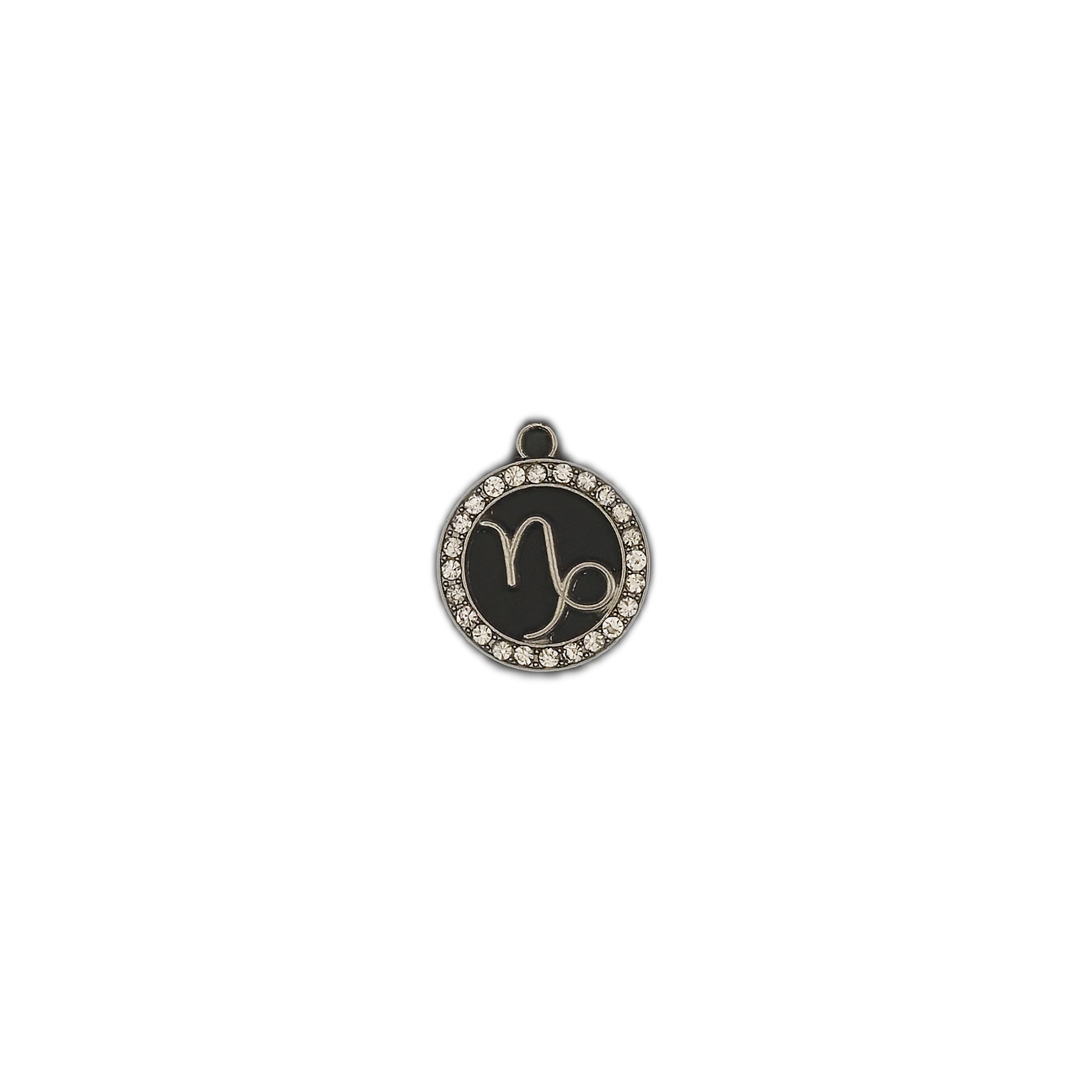 Small round black Capricorn zodiac charm with rhinestone border centered on black background.