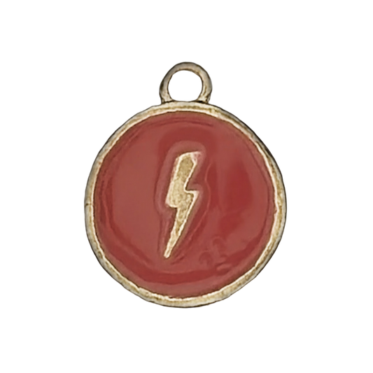 round red enamel charm with gold lightning bolt, close-up