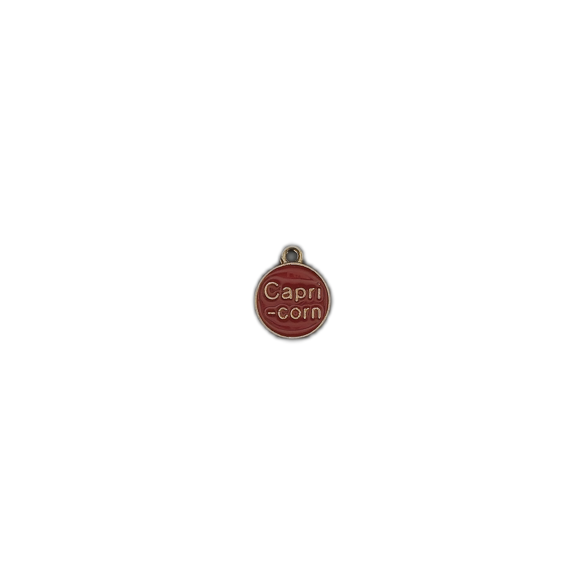 Small red 'Capri-corn' round charm centered on a black background.