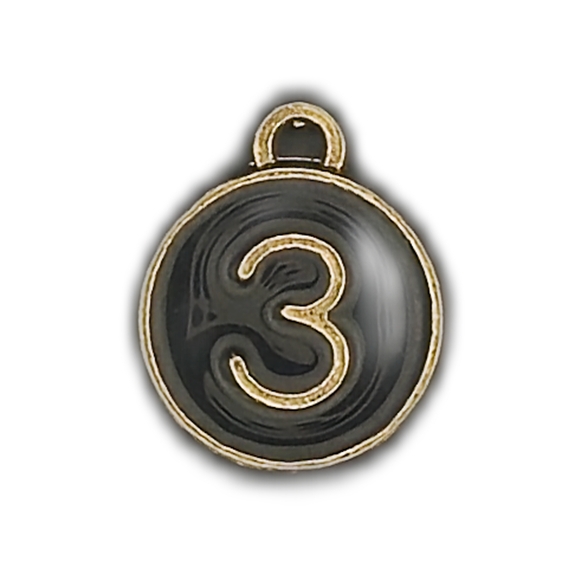 close-up of round black charm with gold number 3