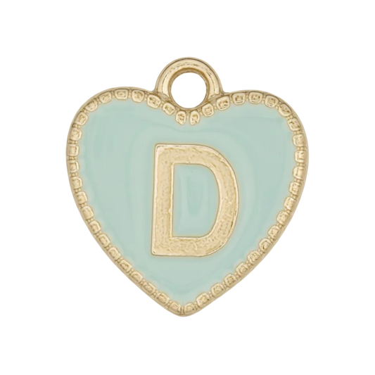 Close-up of a light blue heart charm with a gold letter D.