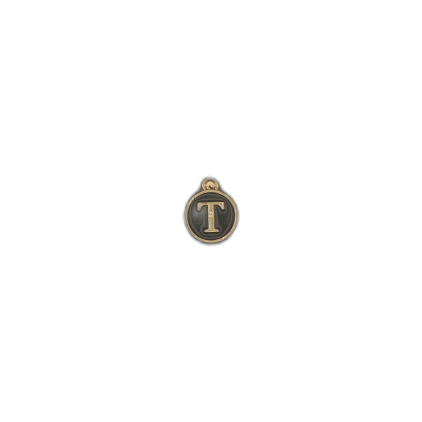 small round letter T charm centered on a black background
