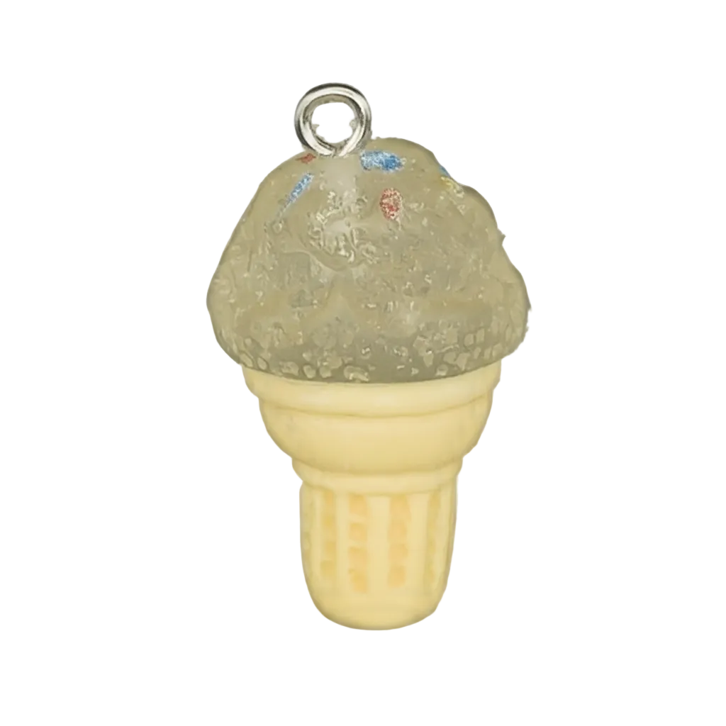 close-up of a small ice cream cone charm with a translucent scoop and cream cone on a black background