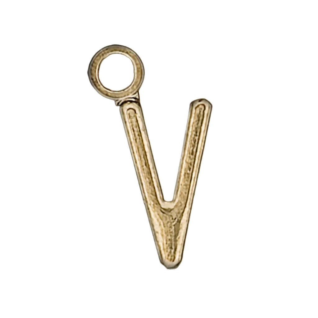 close-up of gold-tone lowercase v charm on black background