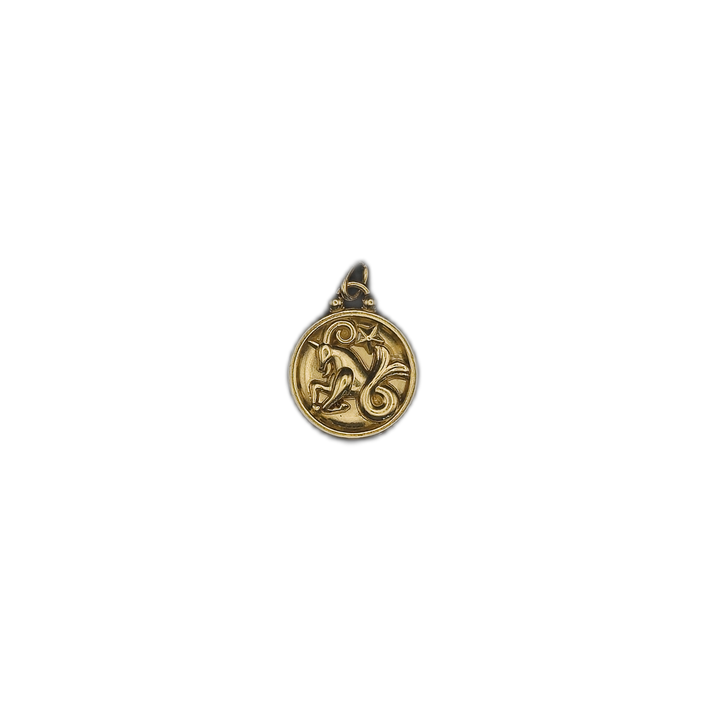 small round gold-tone unicorn medallion charm centered on black background