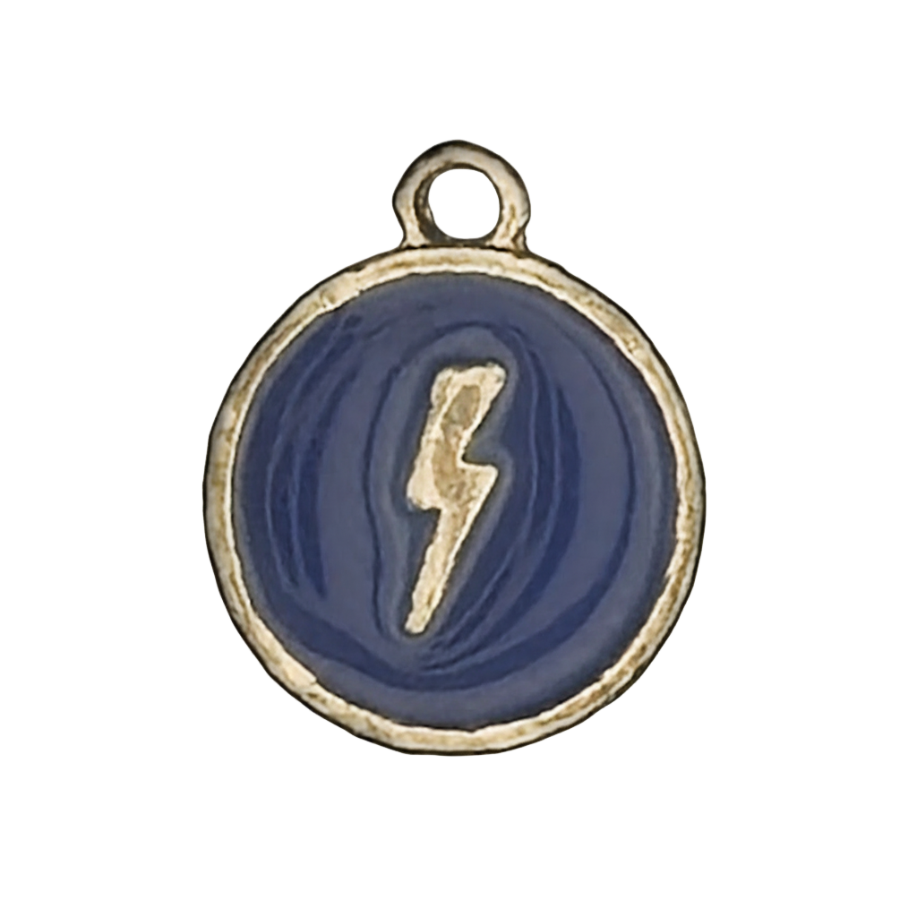 close-up of round blue charm with gold lightning bolt and gold rim