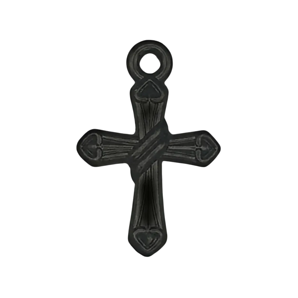 close-up of a small black cross charm with heart-shaped ends on a black background