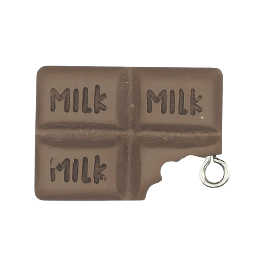 close-up of small milk chocolate bar charm with four squares and bite mark, brown with 'MILK' text