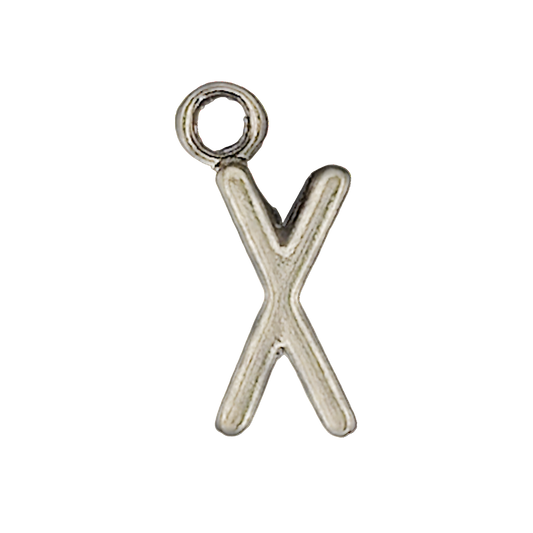close-up of silver letter X charm on black background