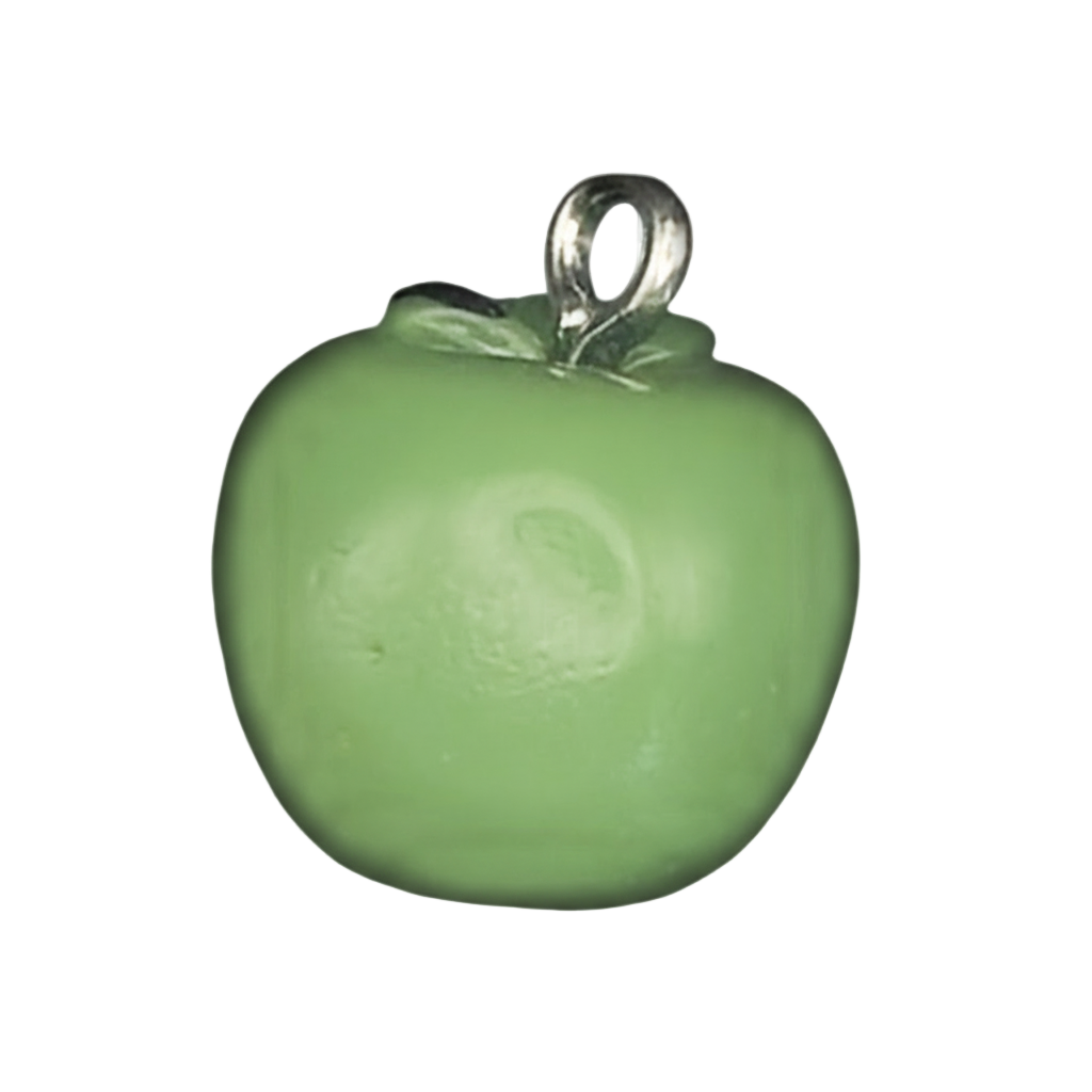 Close-up of a small green apple charm with a silver-tone top on a black background.