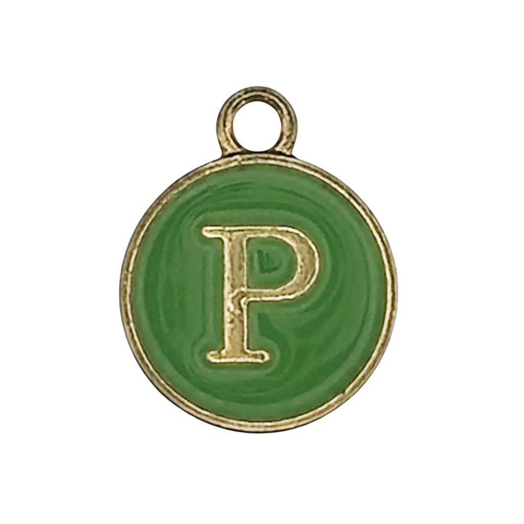 close-up of round green enamel charm with gold letter P and gold rim on a black background