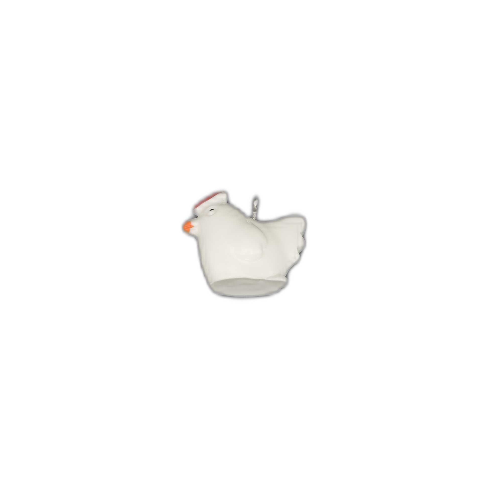 small white chicken charm centered on a black background