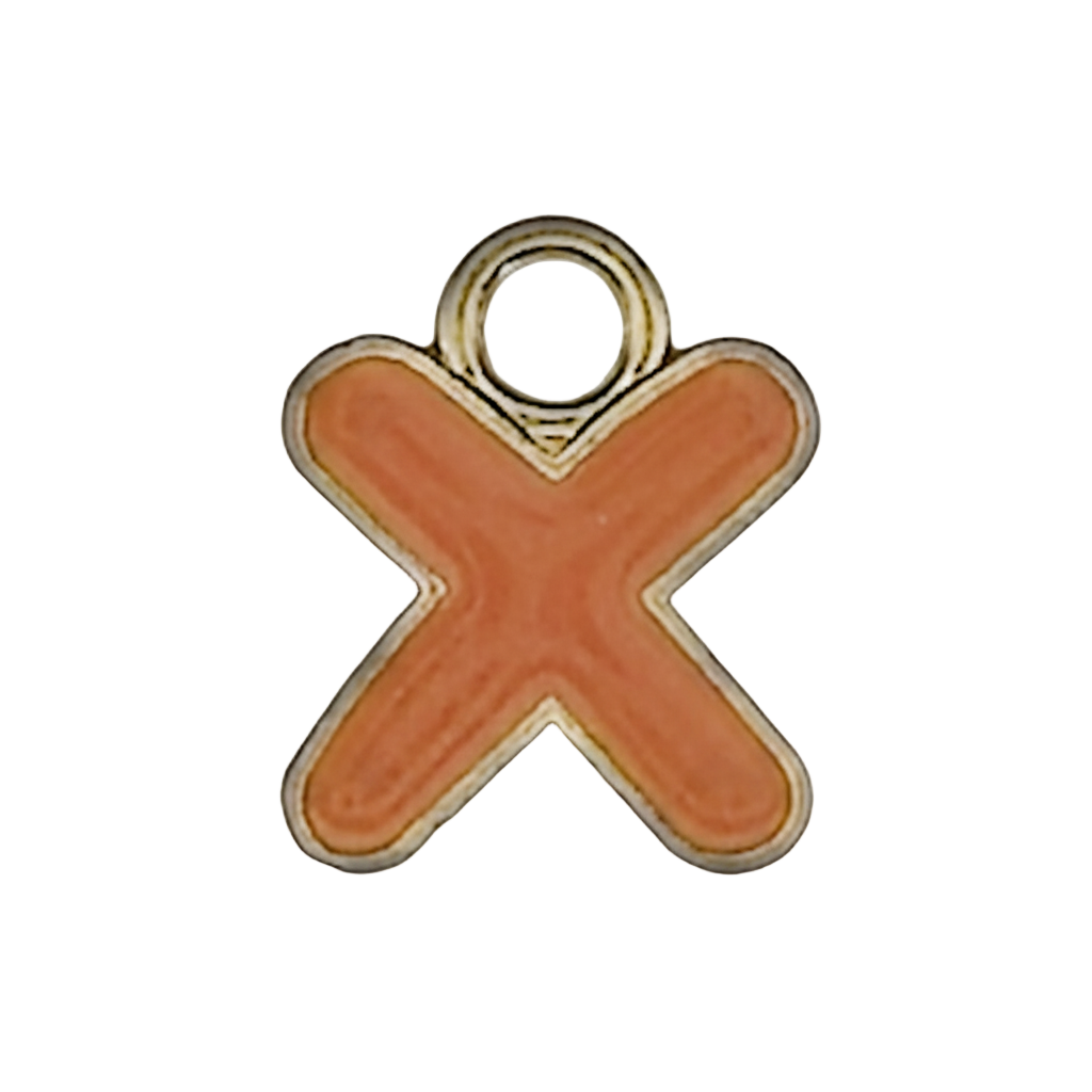 close-up of orange enamel letter X charm with gold outline on black background