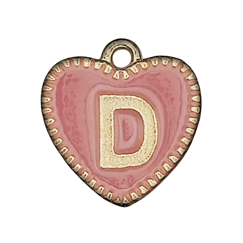 Close-up of a pink heart-shaped charm with a gold-tone letter D and edging on a black background.
