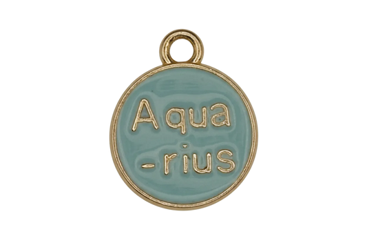close-up of round light blue enamel charm with gold-tone 'Aquarius' text and border