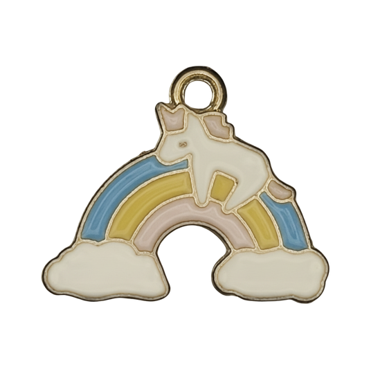 close-up of gold-tone enamel charm showing a white unicorn on a pastel rainbow with clouds