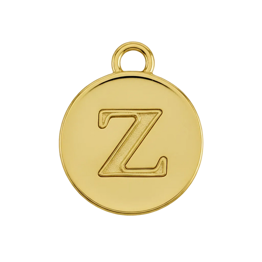 Close-up of a small round gold disc charm with the letter Z.