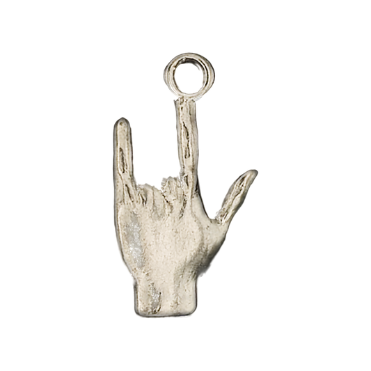 close-up of a small silver-tone hand charm showing the ASL I love you sign on a black background