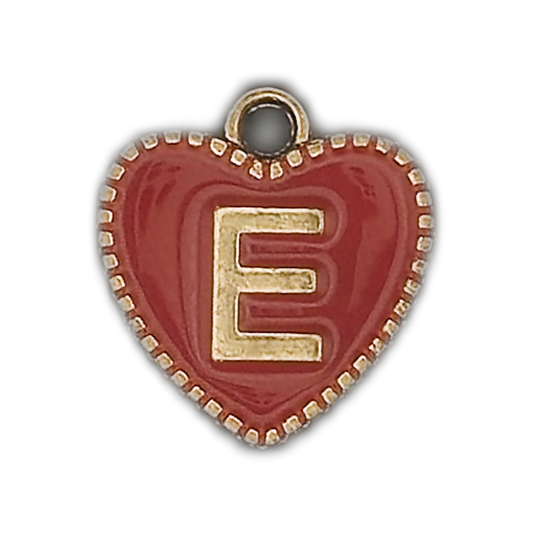 Close-up red heart charm with gold letter E