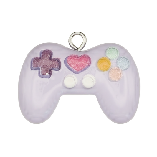 close-up of lavender game controller charm with multicolor buttons and a heart button