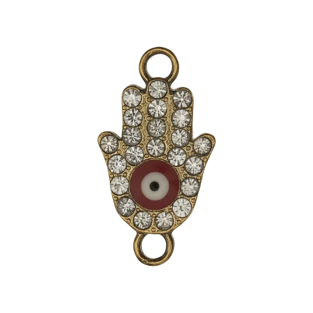 close-up of rhinestone hamsa hand charm with red and white eye on black background