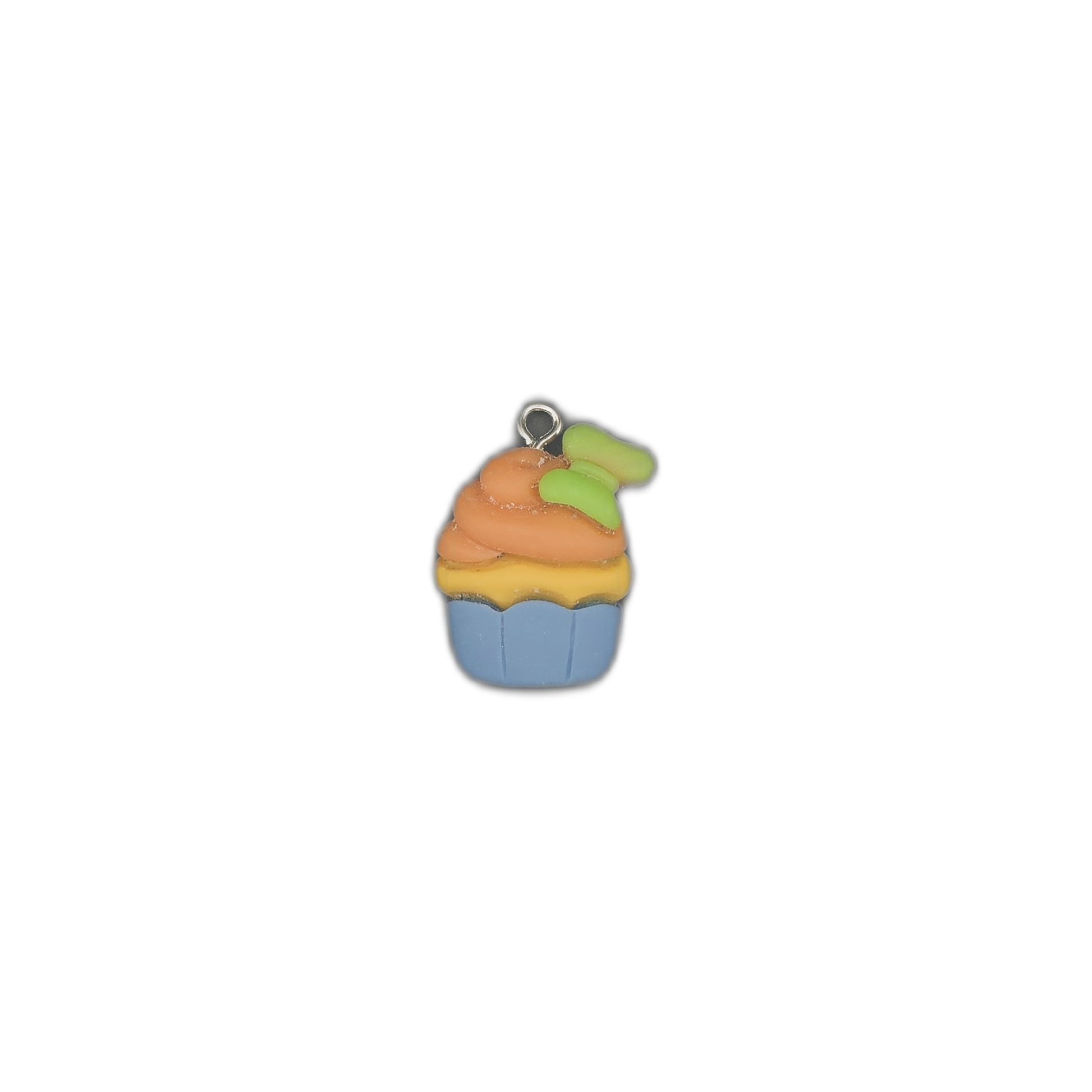 Small cupcake charm centered on a black background, showing a blue cup, yellow layer, orange frosting, and a green accent.
