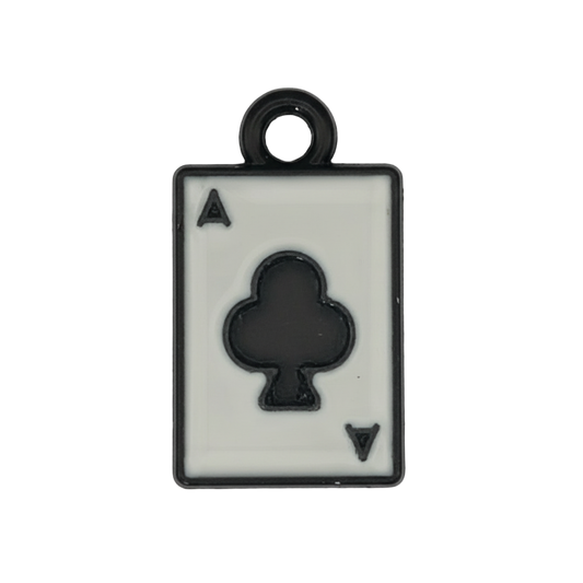 close-up of black and white ace of clubs card charm on a black background