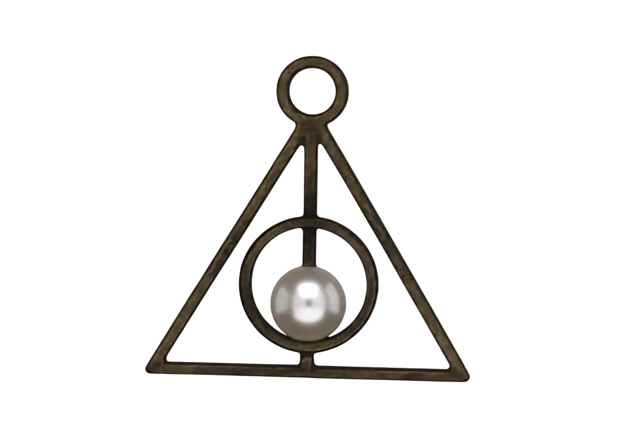 close-up of antique brass triangle charm with a circle and vertical line on a black background
