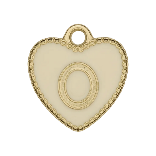 close-up of cream enamel heart charm with gold letter O