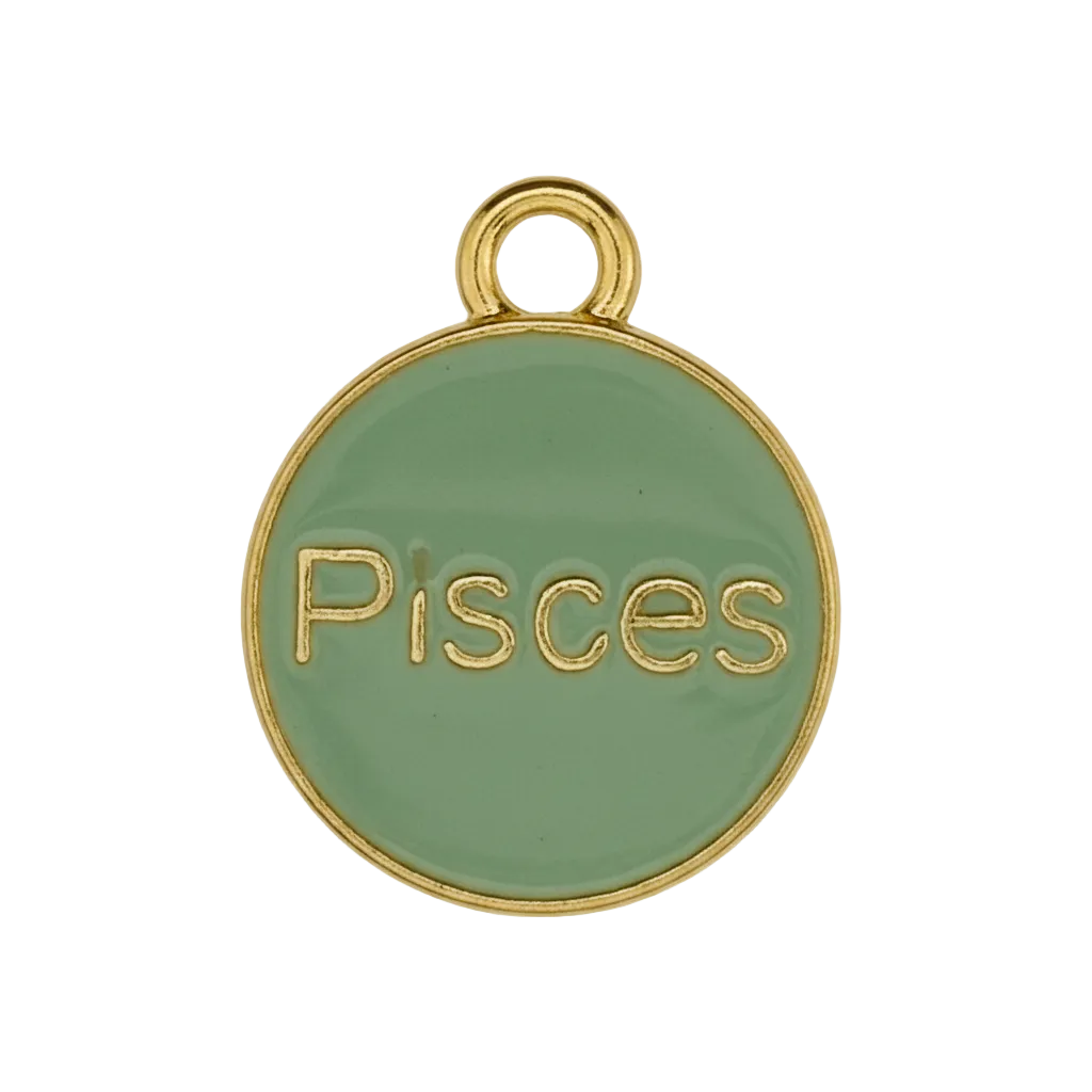 close-up of a small round green enamel charm with gold text reading Pisces