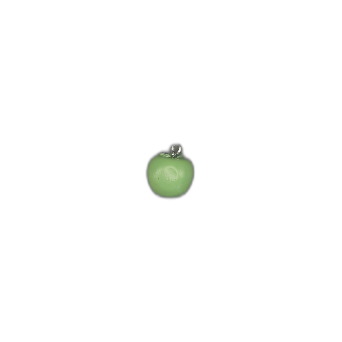 Small green apple charm centered on black background.